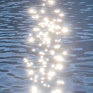 sunlight dappling on lake water symbolizing insights